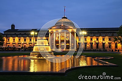 Kurhaus and Bowling Green in the evening with lights, Wiesbaden, Hesse, Germany Editorial Stock Photo