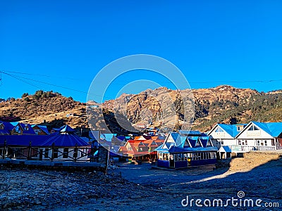 Kuri Village, Kalinchowk - beautiful colorful houses on the valley of a mountain named kuri village, Kalinchowk, Nepal Editorial Stock Photo