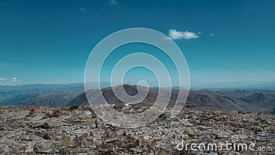 Kurumnik on top of the mountain Dome of three lakes in the Altai and a panorama from the top of the mountain. Stock Photo