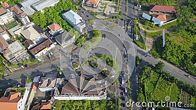 Kuta, Bali, Indonesia, March 15, 2021. Aerial view to road congestion in front of street crossing, approaching Stock Photo