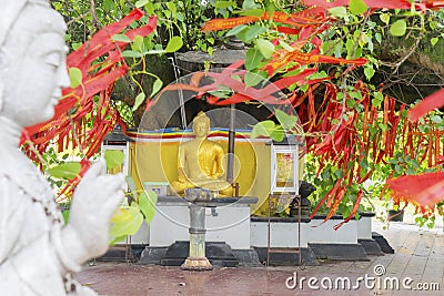 Kwan Im statue with golden Buddha statue Editorial Stock Photo