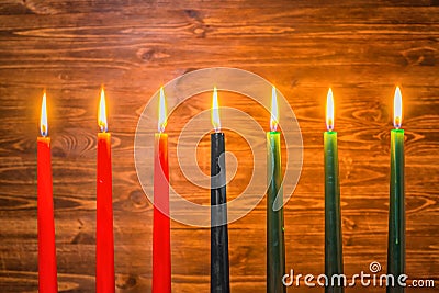 Kwanzaa festival concept with seven candles red, black and green Stock Photo