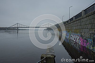 Detailed landscape view of pathway under the water along the Dnieper River embankment Editorial Stock Photo