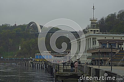 Landscape view of high water in Kyiv. Pathway under the water along the Dnieper River embankment. Editorial Stock Photo