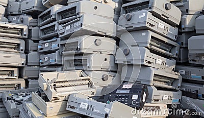 Pile of dot matrix printers on the landfill Editorial Stock Photo