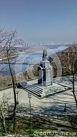 Kyiv, Ukraine, April 3, 2019. View from Volodymyrska Hill in Kiev to the monument to Vladimir the Great and the Dnieper Editorial Stock Photo