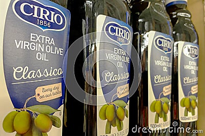 Kyiv, Ukraine 28.07.2023: - Cirio Cucina classico olive oil in glass bottles in shelf in supermarket for sale Editorial Stock Photo