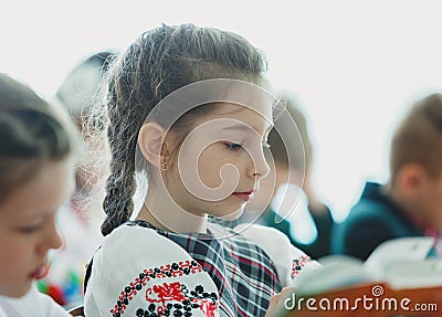 Kyiv/Ukraine - 02 18 2019: Classroom with pupils in school clothes with young attractive teacher in ukrainian school. School life, Editorial Stock Photo