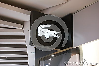 Kyiv, Ukraine, Closeup of Lacoste sign on store front, Lacoste is a french sport clothing brand Editorial Stock Photo