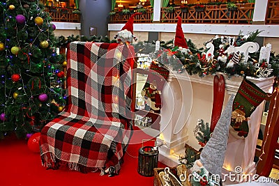 KYIV, UKRAINE - 13 DECEMBER 2021: Christmas corner in shopping center with decorated illuminated Christmas tree. Editorial Stock Photo