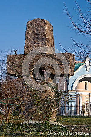 Kyiv, Ukraine. December 02. 2011. Monument to the memory of those who died during the war, stone cross with a bell Editorial Stock Photo