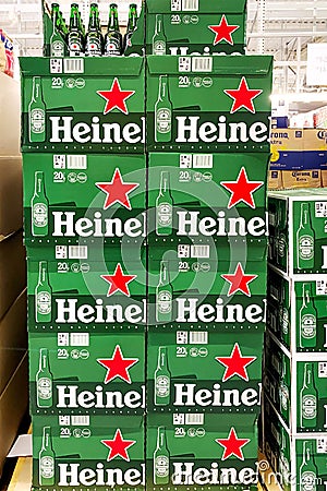 Kyiv, Ukraine 28.07.2023: - Heineken beer brand stacked on large packs on shelw in supermarket Editorial Stock Photo