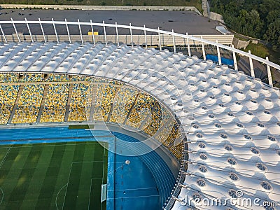 KYIV, UKRAINE - July 19, 2018. Aerial view from drone of construction of the stadium cover, green football field Editorial Stock Photo