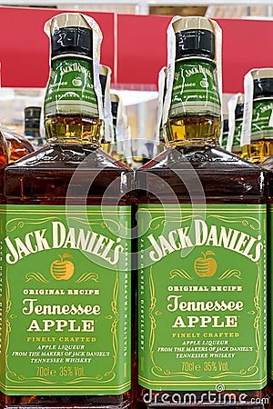 Kyiv, Ukraine, 11 July, 2023: - Bottles of Jack Daniel's Tennesse Apple brand of luxury whisky for sale Editorial Stock Photo