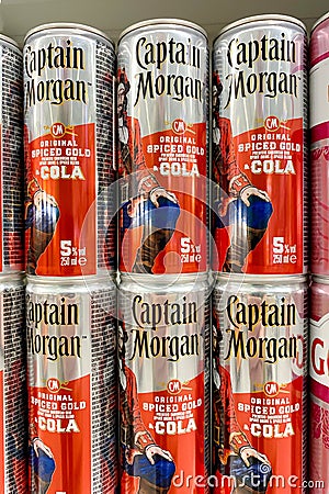 Kyiv, Ukraine, 13 July, 2023: - Cans of Captain Morgan Spiced Gold Rum-Cola brand of luxury cocktail for sale Editorial Stock Photo
