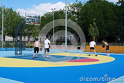 Teenagers plays streetball at new sport zone at expocenter, Kyiv, Ukraine Editorial Stock Photo