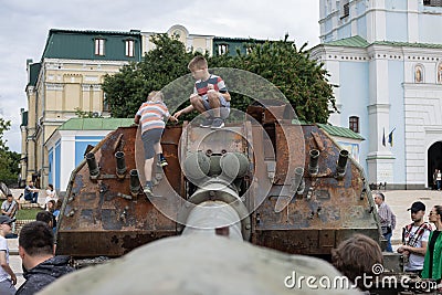 KYIV, UKRAINE - June 06, 2022: Destroyed and burned tank of the Russian in the Kyiv. War in Ukraine. Editorial Stock Photo