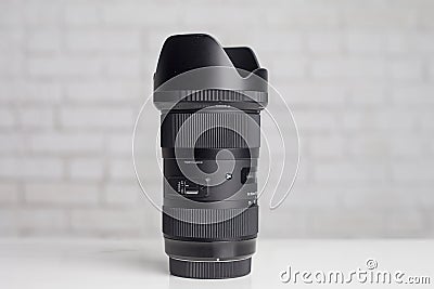 KYIV, UKRAINE - June 15, 2017: Sigma 18-35mm f / 1.8 DC HSM lens for Canon EF. Editorial Stock Photo