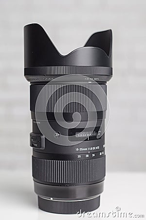 KYIV, UKRAINE - June 15, 2017: Sigma 18-35mm f / 1.8 DC HSM lens for Canon EF. Editorial Stock Photo