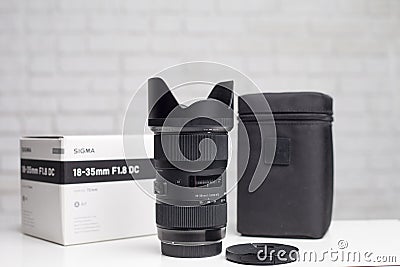KYIV, UKRAINE - June 15, 2017: Sigma 18-35mm f / 1.8 DC HSM lens for Canon EF. Editorial Stock Photo