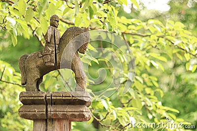 Village gate post carved with a rider. Mamaeva Sloboda, Kyiv, Ukraine Editorial Stock Photo