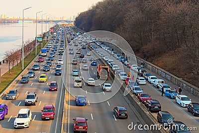 Traffic jam with rows of cars on motorway in the week-end day in Kyiv Editorial Stock Photo