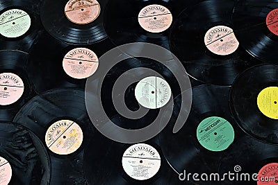 KYIV, UKRAINE - 4 MAY, 2023: Vinyl LP records from 1950-1970. Old Soviet songs on worn gramophone records Editorial Stock Photo