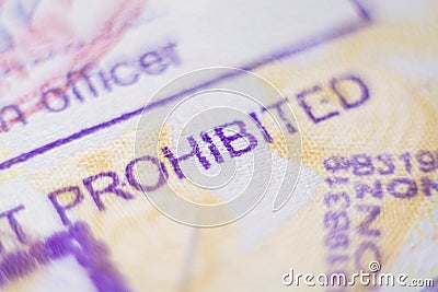 Kyiv, Ukraine - November 2019: close up of customs stamp with the word Prohibited in focus Editorial Stock Photo