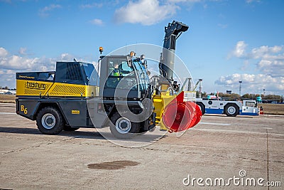 Kyiv, Ukraine - November 5, 2019: Jetbroom BOSCHUNG. Snowplow Snowbooster B6 airport division. Snowblow tractor - Editorial Stock Photo