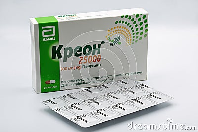 Creon pancreatin pack and blister closeup against white Editorial Stock Photo