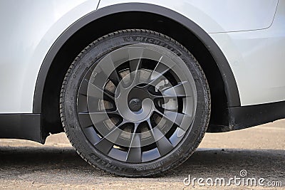 Black rear tire wheel close-up of a car Stock Photo