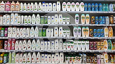 Kyiv, Ukraine - 4 September, 2023: Inside the Auchan supermarket. Showcase with body care products Editorial Stock Photo
