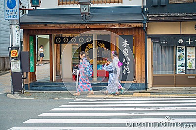 KYOTO, JAPAN - JULY 05, 2017: Unidentified people walking in the city to visit the beautiful view of Yasaka Pagoda Gion Editorial Stock Photo