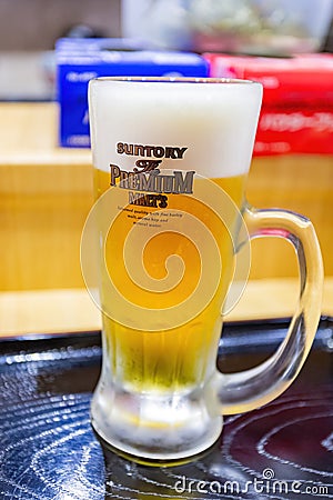 Close up shot of cold Suntory beer Editorial Stock Photo