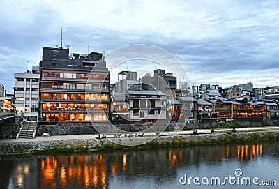 Kyoto`s Kamo River During Early Evening Editorial Stock Photo