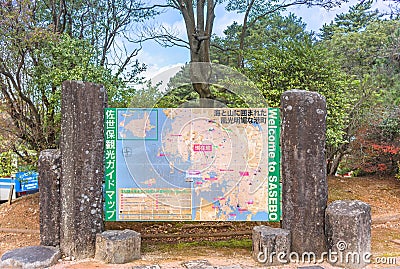 Welcome to Sasebo map at Yumihari observatory illustrated with a map of KujÅ«kushima islands in Saikai National Park. Editorial Stock Photo