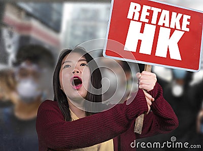 L pacifist Asian woman angry and outraged protesting on street demonstration against China abuse standing for freedom and human Stock Photo