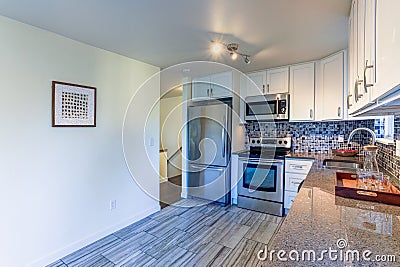 L-shape kitchen room design Stock Photo