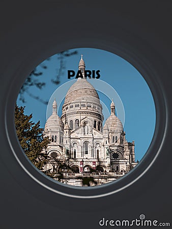 La Basilique Sacre Coeur seen through a circular window labeled Paris Stock Photo
