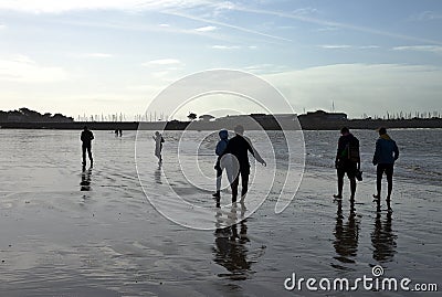 La Baule Escoublac. France - Autumn low tide on La Baule Beach - silhouettes Editorial Stock Photo