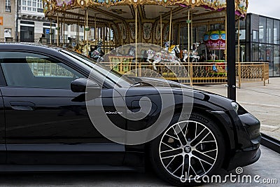 La Coruna, Spain - June 1, 2022: Showing a new car model Porsche, macan, 4s in black. Editorial Stock Photo