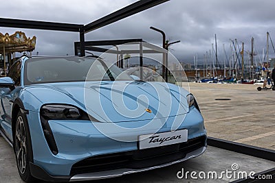 La Coruna, Spain - June 1, 2022: Presentation of the new porsche car model, taycan, 4s, cross turismo. Editorial Stock Photo