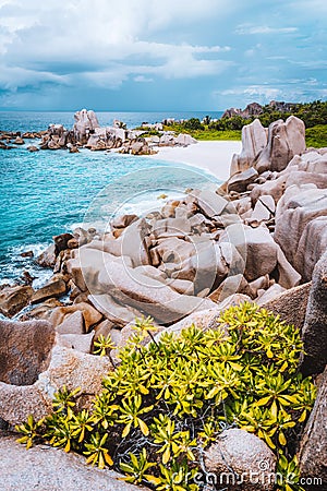 La Digue island coast, Seychelles. Hidden secluded remote beautiful beach in jungle Stock Photo