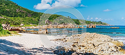 La Digue, Seychelles. Panoramic view of beautiful secluded beach, tropical ocean coastline, unique granite rocks and Stock Photo