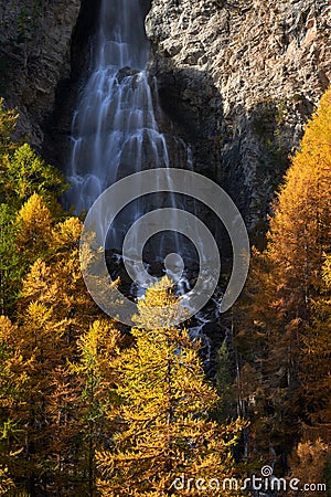 La Pisse waterfall in Autumn in the Queyras Regional Natural Park. Ceillac, Hautes-Alpes, Alps, France Stock Photo