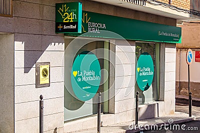 Eurocaja Rural logo on a bank branch office in La Puebla de Montalban, Spain Editorial Stock Photo