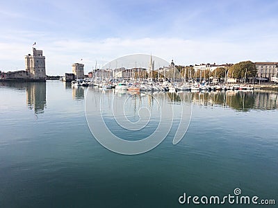 La Rochelle , Aquitaine / France - 08 30 2019 : la rochelle harbor Towers of ancient fortress charente France Editorial Stock Photo