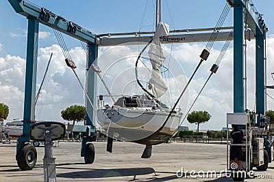 La Rochelle, Aquitaine / France - 04 15 2020 : sailboat in harbor shipyard for repair and maintenance in marina port Editorial Stock Photo