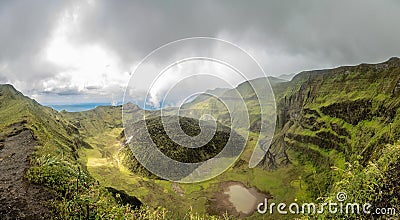 La Soufriere volcano crater panorama with tuff cone hidden in green, Saint Vincent and the Grenadines Stock Photo