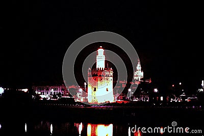 LA TORRE DEL ORO THE GOLD TOWER BY NIGHT IN SEVILLE, SPAIN Stock Photo